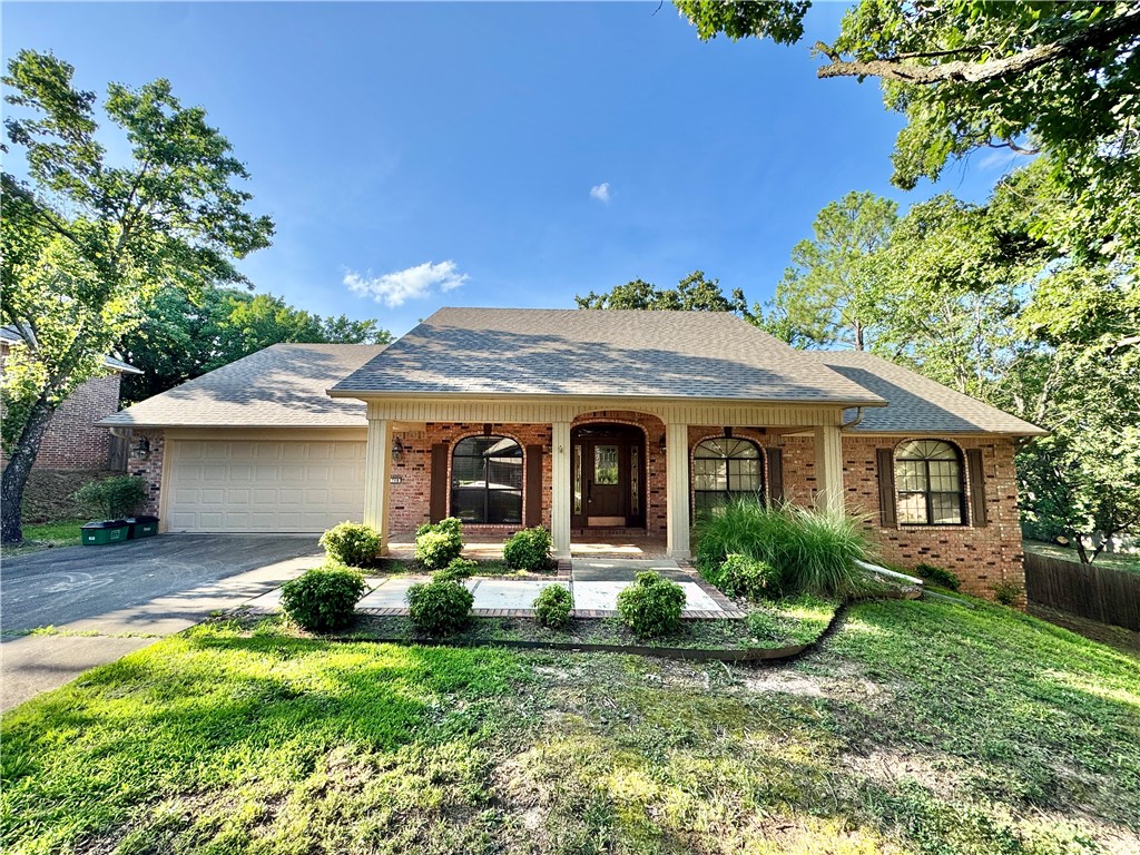 Beautiful single family home in the heart of Fayetteville. This all brick, four bedroom, two bath home is move-in ready. Lovely entryway leads to a formal dining space and large living room. This property features a large kitchen with updated stainless steel appliances. Floor to ceiling brick fireplace with built-in cabinetry. Big covered back porch equipped with a ceiling fan overlooks the backyard. Ample storage space throughout. 2 car garage. Unbeatable location! Enjoy walks and bike rides on the Razorback Greenway that is right across Old Wire. This home is minutes from Dickson, parks, schools and is a must see! Call today for a showing.