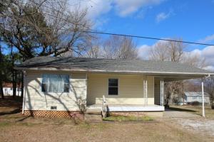 2 BR 11/2 bath home in Bellefonte with central heat and air, gas range, refrigerator, shed, 1 car carport with near level yard and maintenance free exterior. Bank owned and owner does not make any representations or warranties. All #s are approx., age is estimate, sq. footage per assessor. Buyer to verify existence of septic.