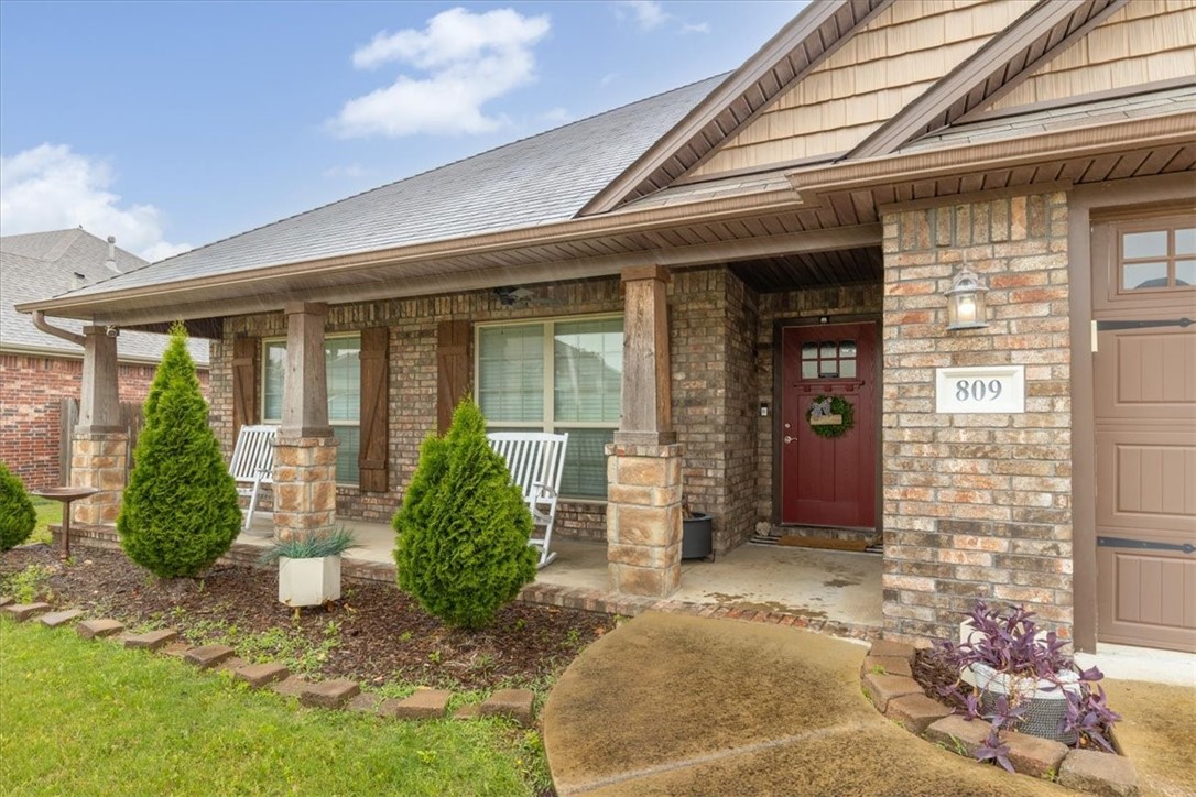 Don't walk Run to this amazing home with a full solar system! This 3-bedroom, 2-bath home that blends thoughtful design with everyday ease. The spare bedroom has a custom built in murphy bed that allows for ample office or bedroom space. The open floor plan connects living, dining, and a kitchen outfitted with stainless steel appliances and plenty of prep space. The layout brings warmth throughout the main living areas, while a heated and cooled sunroom at the back invites quiet mornings or relaxed evenings with a peaceful yard view. Just a mile from Cave Springs City Park and minutes from NWA Airport, this location offers convenience without the noise. A well-balanced home in a spot that makes life easy—and a little more beautiful.