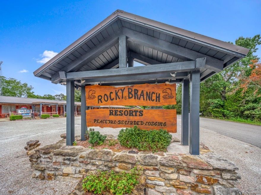 Turn key business opportunity nestled in the heart of the Ozarks, right on Beaver Lake! Well established with customer base built over 30 years! Listing includes: Lodge with 14 suites (guest area, gift shop, office & managers' apartment), Clubhouse (1200 sq.ft) & Pavilion (seats 100), 3 Mobile Cottages, Summer Cottage (3 bed, 2 bath), RV Pad, and so much more! All set with courtyard, pool, playground & volleyball court! Beautiful decor and details throughout!