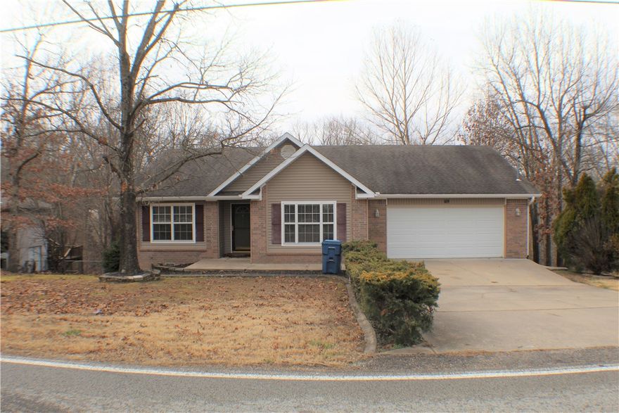When you walk into this spacious family home, your jaw will drop at the soaring cathedral ceilings that greet you. Accent lighting in the living room for a nice ambiance as you lounge in front of the gas log fireplace. Living room, kitchen and dining room is open concept. Kitchen features plenty of cabinets and a pantry for extra storage space. Brand new luxury vinyl plank flooring in master bedroom and lower level bonus room. Master bedroom features his & hers closets, a walk in shower in master bath and a linen closet! Split bedroom floor plan with two more bedrooms and a guest bath off the entryway. The lower level walk out has a bonus room for whatever your heart desires. Large closet and small nook area with cabinets would be great for an extra refrigerator. Storage building is perfect for your lawn tools. Screened in deck for enjoying bug-free evenings!