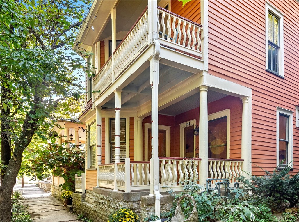 The downtown Spring Street location doesn't get any better. This Victorian two-story tourist lodging cottage has all the charm and character you could imagine or want. A great Eureka getaway currently operating as two nightly lodging units. Zoned C-3 commercial which allows for numerous other uses. Keep one unit for yourself or draw income from both and block off time you want to visit. Each unit is a 1BR/1BA with a kitchen and living area. The house has all the character that makes a great cottage - beautiful vintage pine floors, bay windows with bench seating, fish scale accent shingles, corbels, and stained glass. Each bathroom has been remodeled and has new showers with white subway tile walls and black hex tile floors. The main level has a front porch and French doors out to a secluded back patio with limestone bluffs. The second floor has a covered porch off the bedroom and a balcony in the back. A great location for a VRBO and furnishings convey. Short jaunt to your favorite downtown shops and restaurants.
