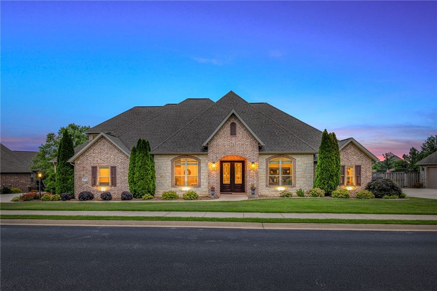 Oak Tree Home w/Pond Views! Featuring 4 bedrooms plus home office and a bonus room. High end finishes throughout include hardwood floors, wainscoting, central vac, Sonos sound system & full irrigation! Foyer entry welcomes you as you are greeted by a large windows overlooking backyard views. Living room has vaulted & beamed ceilings, gas fireplace & custom built-ins. Kitchen is a fantastic workspace, complete w/island & prep sink, gas range w/pot filler, mixer pull out stand & large pantry. The dining space has great natural light & built in buffet. Patio provides relaxing outdoor living space, enjoy your landscaped backyard w/large trees for privacy, iron fencing & vaulted patio ceiling. The primary suite has access to the patio & an attached bath w/tub, large walk-in shower and double vanity. Two guest beds on main level attached by jack&jill bath. Laundry room has \ wash sink & a pull out iron board. Oversized 3 car garage. Bonus room upstairs w/wet bar area. A jack&jill bath leads to the upper-level guest bed.