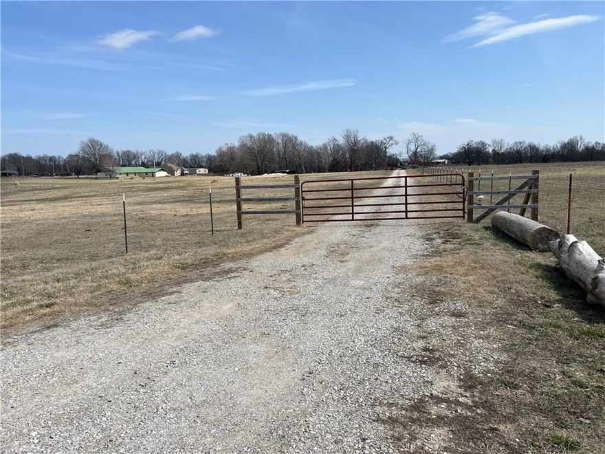 Come see this beautiful piece of land that is conveniently located just minutes from I-49, a short drive from downtown Springdale and just a short drive to Beaver Lake! This 8.75 acres would be great for a home and mini farm or to split in half and build 2 homes on it! With fencing and a driveway through the property its ready to make your dreams come true, schedule your showing today!