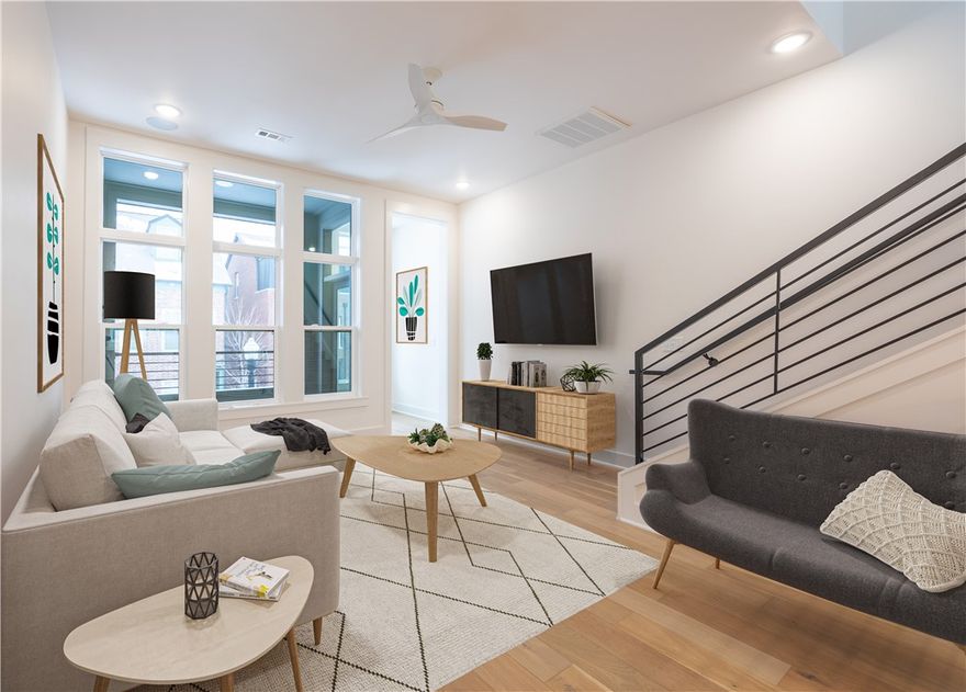 Developed by a local development company, this townhome boasts a variety of amenities such as an open floorplan design, architectural detailing, outdoor patio, slab quartz countertops, tile backsplashes, hardwood flooring throughout, full tile showers, GE appliances, and a single car garage. Located just next to the downtown Skylight movie theater, and an easy walk to the Bentonville square, Walmart home office, the new Momentary museum, and local shops and restaurants