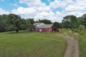 Welcome to 362 Lower McGuire Loop in Russellville, Arkansas! This remarkable property offers a3.18 acres of scenic land, providing ample space and privacy. Featuring a multi-level design, this charming home boasts three bedrooms and two bathrooms, perfectly accommodating your family's needs. Step inside to discover the tastefully renovated interior, where brand new flooring adds a touch of elegance throughout. The bathrooms have been meticulously updated, exuding a modern and refreshing ambiance. With its spacious layout and pristine surroundings, this property presents a wonderful opportunity to enjoy peaceful living in a convenient location. Don't miss the chance to make this your dream home!