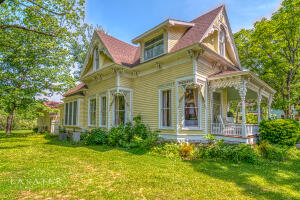 Own a little piece of History!! Kirby Manor could be yours. Currently operating as a 2 unit nightly rental, Goldie's upper room and Dr. Kirby's quarters, with potential for more. Home is 3 bedroom 2 bath and is currently listed on the historic register. Beautifully manicured, new roof, wood floors throughout, claw foot tubs, and amazing architecture. The Carriage House is a separate building that could easily be rented. The barn is maintained with the potential for event hosting. The possibilities are endless. Call now for a showing before it's gone.