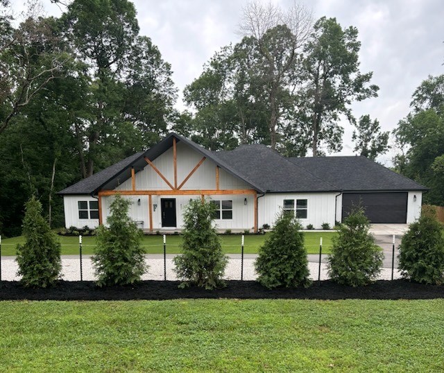 Welcome to your gorgeous 2023, Goshen home. Located right on the line, with a Fayetteville address and Goshen location. 38 Green Giant trees have been planted to add privacy. This 3 bedroom home has an office that can be a 4th bedroom. The kitchen includes beautiful, soft close cabinetry, dual a/c with sleeping temperature to "snuggle time" while the rest of the house remains as you like. No restrictions, no hoa, no covenants. Only 15 min from Fayetteville. Directly behind the lot is Goshen's 111-acre Mill Branch Park which runs alongside historic Mill Branch Creek as well. One of the largest city parks in NW Arkansas, Mill Branch park has 2 ponds and spring creek running through it. There are 3 miles of walking trails, as well as a 9 hole disc golf course. It has some of the best views in all of Goshen!