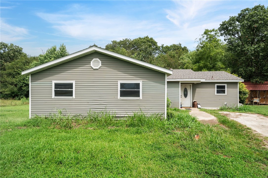 This 3-bedroom, 2-bath home sits on 3.29 acres and gives you the space you’ve been craving—inside and out. Step into the open living, dining, and kitchen area where everything flows together, anchored by a kitchen with plenty of cabinets and workspace. The bedrooms aren’t just “bedrooms”—they’re generously sized with plenty of room to relax, and the bathrooms actually have room to move.
Outside, a concrete deck is ready for grilling, gathering, or winding down after a long day. You’ll also find a well house and a storage building—practical features that keep the rest of your home clutter-free. And with over three acres to spread out on, you can bring your projects, hobbies, or animals and still have room left over.
If you’ve been waiting for a place that feels wide open and truly your own, this one’s it.
**This property is being sold as-is.**