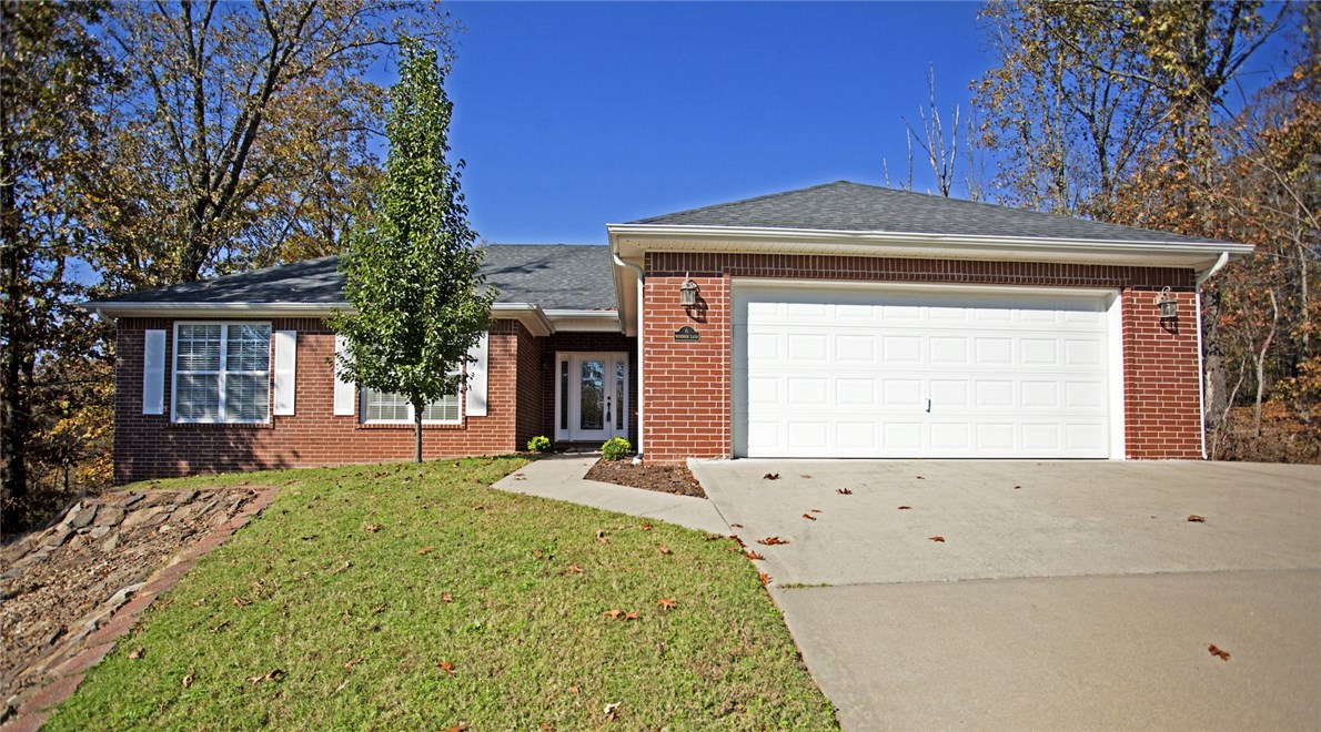 Charming 3 bedroom 2 bath home in Windsor Subdivision. New carpet and new paint! Enjoy this open floor plan with gas fireplace, large archways, lots of natural light, thermostatically controlled fireplace and open floorplan. Spacious kitchen with tons of custom cabinets, counter space, under cabinet light, granite counters and separate veggie sink. Eat-in kitchen with built-in desk, formal dining room, two car garage and attic space. Large Master Bedroom with sitting area, access to the patio and master bathroom. Patio with beautiful view of mature trees.