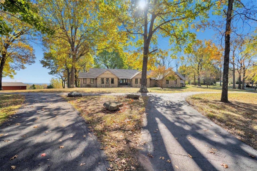 Welcome to this stunning, fully remodeled 4-bedroom, 3.5-bathroom estate, perfectly situated on 4.75 picturesque acres that has 2 parcels. This home showcases high-end upgrades, including a chef’s dream kitchen equipped with Wolf and Sub-Zero appliances, soapstone and butcher block countertops, large drawer cabinets, a wine fridge, a warming drawer, and a cozy kitchenette beneath a soaring vaulted ceiling. The luxurious primary suite features a roll-in shower, an expansive walk-in closet, and breathtaking views. Additional highlights include a spacious mudroom, an oversized 2-car garage, a detached 2-car garage/shop, a saltwater gunite pool, and irrigation system. Enjoy peace of mind with Anderson windows, a new roof and gutters, and a comprehensive security and sound system. This exceptional property offers both luxury and functionality, designed for the ultimate living experience.