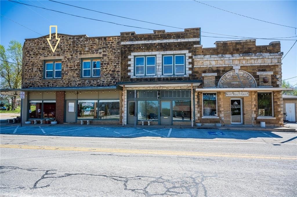Studio loft apartment-Fully furnished and utilities included! Beautifully remodeled studio apartment, situated above a trendy cafe in a historical building. This space is furnished with stylish furnishings throughout. Prime location ensures an easy commute to Springdale, Fayetteville, and Huntsville, making this an excellent choice for professionals and commuters alike. Enjoy the convenience of all utilities being included in your monthly rent and revel in the blend of modern comfort and historical charm. This apartment is a unique find, contract us today for more information and to schedule a viewing! Agent Owned