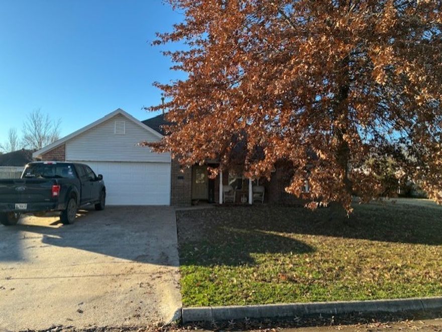 This great home is located in an established neighborhood and is looking for it's next owner.  It offers a large entry, gas log fireplace and vaulted ceiling in the living room, trey ceiling and bay type window in the Master bedroom, a walk-in shower, whirlpool tub and a privacy fenced backyard.  No carpet, just beautiful tiled flooring!