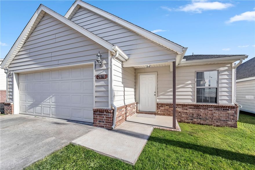Welcome home to this charming 3-bedroom, 2-bath traditional home nestled in the peaceful Scottswood Place subdivision — just minutes from the University of Arkansas, shopping, and top-rated Fayetteville schools. Sitting on a quiet cul-de-sac lot, this well-maintained 1,580 sq ft home has been freshened up with Brand New Carpet, Fresh Paint throughout, and a New Roof, so you can move right in with confidence. The open layout features an eat-in kitchen with a full appliance package, a walk-in closet, a whirlpool tub, and a convenient washer/dryer that convey. The attached 2-car garage with opener adds everyday ease, while central electric heat and air keep things comfortable year-round. This move-in ready gem checks all the boxes — style, location, and value. Don't wait, homes like this don't last long!
