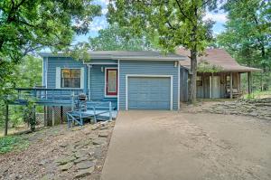 If you have been hunting seclusion close to town Gum lane may just fit the bill. The main house is 1768 sq feet with a wrap around covered deck, large living room with fire place, open kitchen with a comfortable feel. There is also a guest house/ mother in law house or man room on the property. All this less than 10 minutes from town, close to the lake and only 129900.00