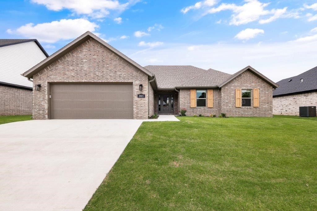 Gorgeous 3 bed 2 bath split floor plan home in Riverwalk Subdivision - one of Fayetteville's most sought after communities - where you can enjoy the community pool, walking trails, White River Access and stunning views! This beautiful brick home boasts vaulted ceilings in the living room with a cozy gas log fireplace, hardwood flooring throughout, ceramic tile and carpet, gas range, stainless steel appliances and quartz countertops. All brand new appliances - including the SS refrigerator and washer/dryer!