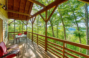 Gorgeous 23.73 acres with 5 cabins. Great location less than one mile outside of Jasper with a total of 7,104 sf of rental or living space and over 1,685 sf of covered wood decks and porches. These cabins are built on open piers and are referred to as 'tree house' style cabins since they are built from 5 feet to about 20 feet off of the ground which allows for views from the tree level. The property offers nice views with seasonal views of the Little Buffalo River and has Spider Creek frontage. Cape Buffalo Cabin 1,728sf 5BR 2.5BA, Wood Bison Cabin 1,344sf 3BR 1.5BA, Water Buffalo Cabin 1,344sf 3BR 1.5BA, Plains Buffalo Cabin 1,344sf 3BR 1.5BA, American Buffalo Cabin 1,344sf 3BR 1.5 BA. (See supplement for additional details). Great investment potential or family retreat. Can be divided.