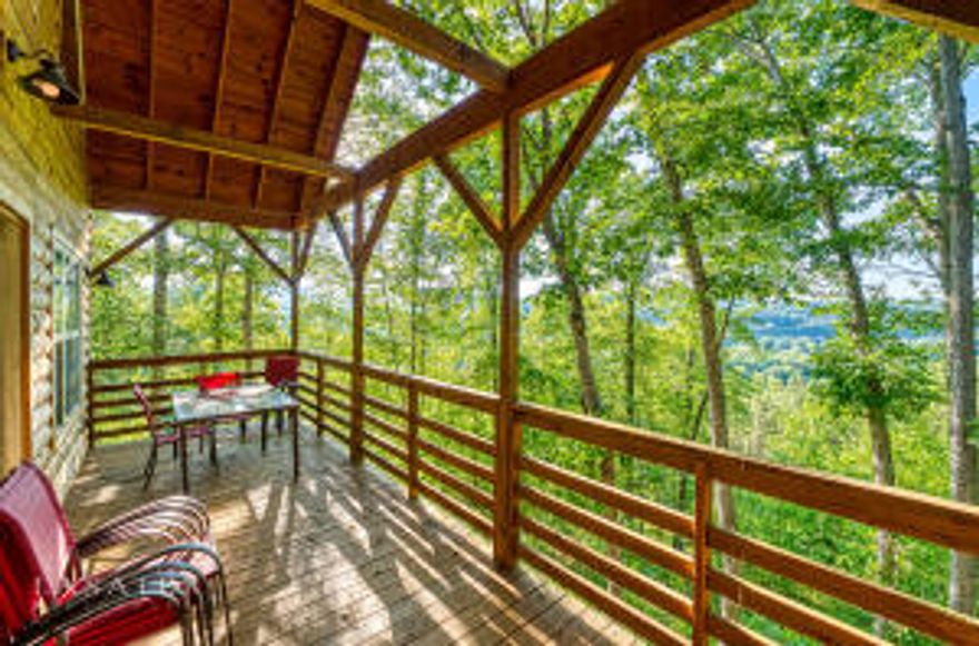 Gorgeous 23.73 acres with 5 cabins.  Great location less than one mile outside of Jasper with a total of 7,104 sf of rental or living space and over 1,685 sf of covered wood decks and porches. These cabins are built on open piers and are referred to as 'tree house' style cabins since they are built from 5 feet to about 20 feet off of the ground which allows for views from the tree level. The property offers nice views with seasonal views of the Little Buffalo River and has Spider Creek frontage.  Cape Buffalo Cabin 1,728sf 5BR 2.5BA, Wood Bison Cabin 1,344sf 3BR 1.5BA, Water Buffalo Cabin 1,344sf 3BR 1.5BA, Plains Buffalo Cabin 1,344sf 3BR 1.5BA, American Buffalo Cabin 1,344sf 3BR 1.5 BA. (See supplement for additional details). Great investment potential or family retreat. Can be divided.