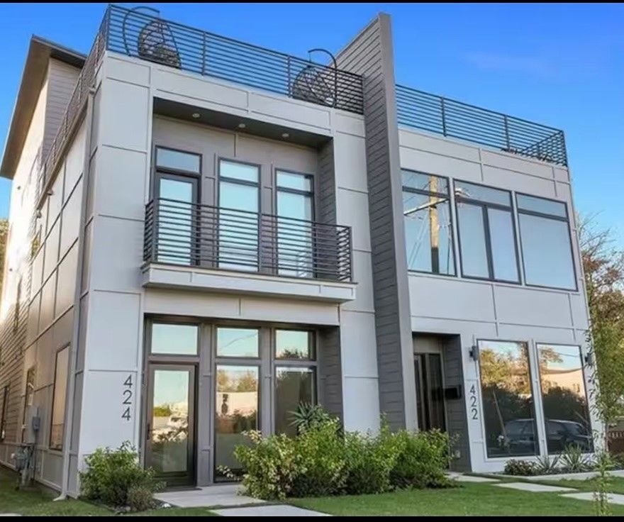 LOCATION AND DESIGN!!! You have it all with this luxurious townhome set right in the middle of it all...just 1 mile from the new Walmart home office! There are 3,300 sf of interior goodness that are illuminated by floor-to-ceiling steel framed picture windows. Featuring an open concept design with separate floors for entertaining and living, 3 bedrooms, 3.5 baths, media and family rooms, and a separate studio apartment with its own entry. Designer finishes and special features include custom cabinetry, quartzite waterfall counters, glass display shelving, high-end appliances, 3 fireplaces, and a fabulous rooftop terrace. Located just steps from The Momentary, this home provides immediate access to Bentonville's vibrant cultural scene and rich artistic experiences. This exquisite 3-story townhome offers a rare blend of modern luxury and urban convenience in a walkable, bike-friendly community. Don't miss out on the opportunity to own this beauty as an investment opp or as your own personal residence!