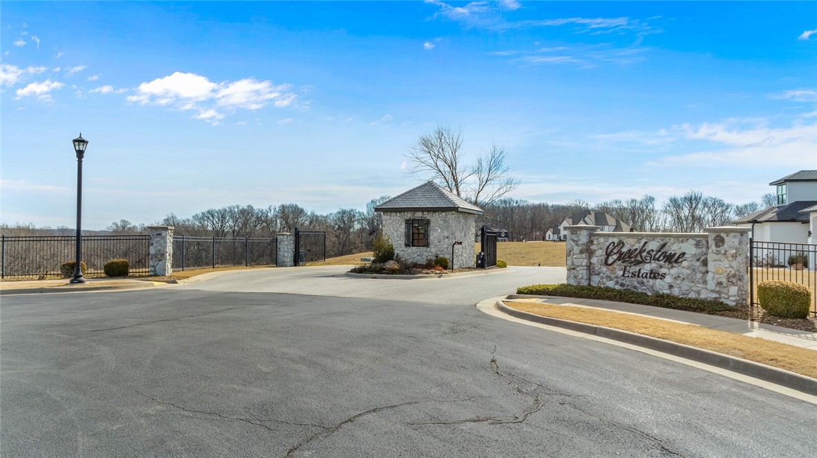 Perfect 3+ acre estate lot in the exclusive and highly sought after Creekstone Estates Subdivision in North Bentonville to design and build your dream home on! Partially wooded for privacy, gorgeous views, convenient to 49 and downtown Bentonville, yest tucked away. All utilities on site and ready to go. Don’t miss this opportunity on an amazing lot to call home!
