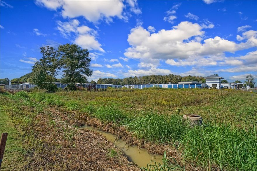 Looking for the perfect spot to start or grow your business? This surveyed lot in Russellville sits right off Knoxville with great road frontage and visibility! Located in a high-traffic area, it’s a prime piece of land ready for development. Opportunities like this don’t come around often bring your plans and make it yours!