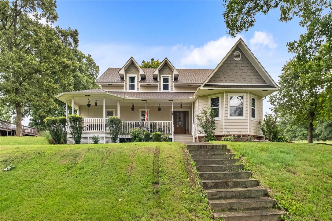 Let's talk about the perfect combo! 40+ acres mol, beautiful 3/2.5 home with multiple living areas, VERY spacious rooms, 2 story, LOTS of storage, recently replaced HVAC, detached 2 car garage, front porch with a view, above ground pool with full deck around (very large sized pool), storm shelter, ARENA/option to create living quarters (previously had an office space - utilities are present - would have to be remodeled/rebuilt), stalls, in-door arena option, LOTS of man space, back to acreage, fertilized over the years, AND....wait on it.... gorgeous view of the creek from the field if anyone ever wanted to build their dream home with a view! Meanwhile, great option for hay, livestock, has a pond! TOO MUCH TO MENTION (like...fireplace....) All electric, well and rural water....in the heart of NWA! Welcome to Summers! A diamond hiding by all the nature ARKANSAS brings to life! * New roof 2024!