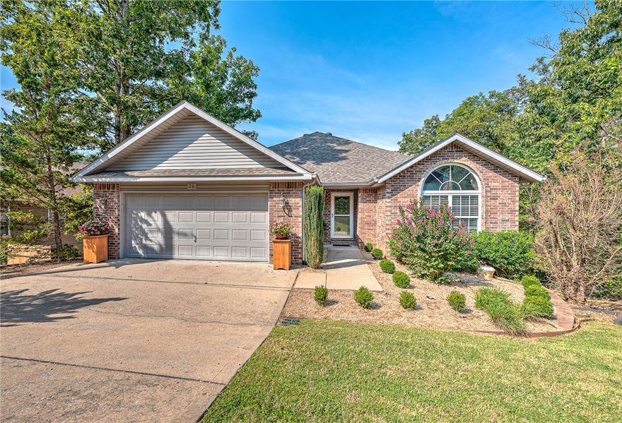 This perfectly updated & extremely well-kept home with a perfect Ozark mountain and seasonal Lake Ann views. Located in the desirable Back 40 and Lake Ann area with direct access to the mountain bike trail, Flo Ride and just up the street from the Lake Ann boat ramp. You are not likely to find a better maintained, thoughtfully updated and flexible floor plan than this. The main level has a lovely living area with gas fireplace, well appointed kitchen, full bath, primary bedroom & ensuite as well as an office which could easily be used as a 4th bedroom. The lower level, equally well appointed, features a second living space with gas fireplace, two bedrooms, full bath and a finished walk out bonus area with endless options for use. This home is move-in ready and is perfect for the outdoor life adored by all in Bella Vista! New roof-2020. HVAC-2017 (w/ 2 zones, 20 SEER, maintained twice annually by Paschal). *MOTIVATED SELLER *NEW CARPET INSTALLED 9/26/25* *AMAZING OPPORTUNITY* *PERFECT LOCATION*