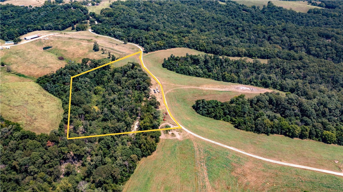 Aerial view showcasing a cleared, open field area