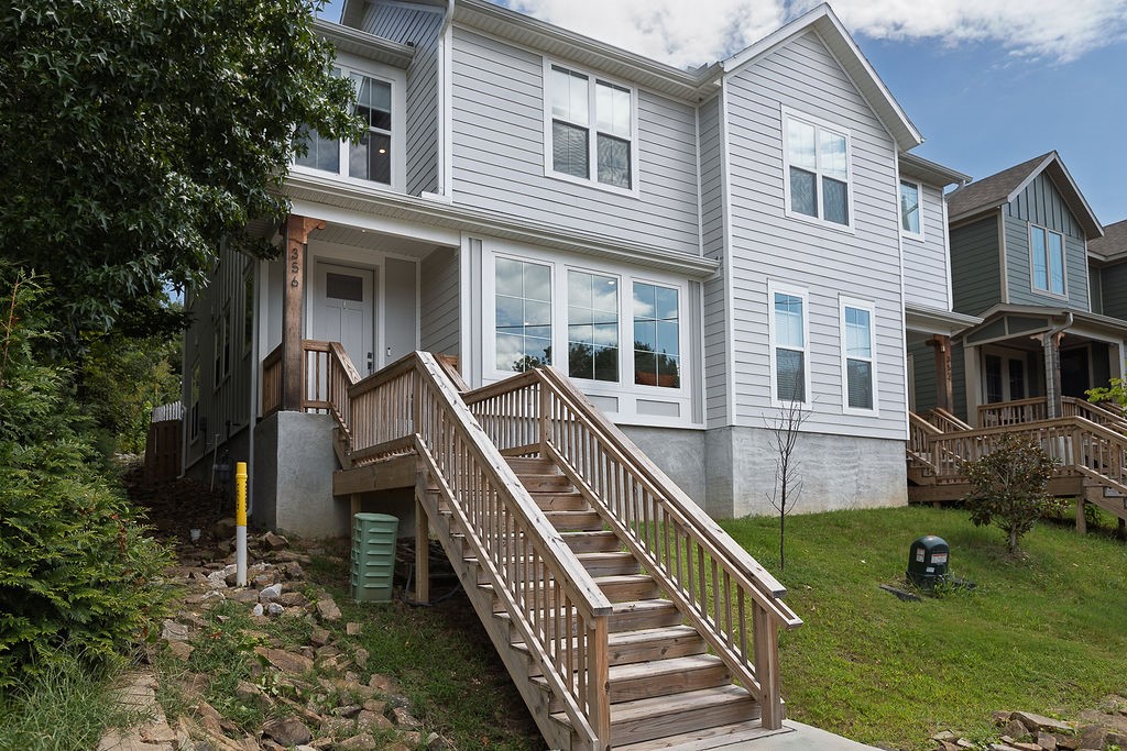 Architecturally designed 3 bed, 2.5 bath townhome located a few blocks from Dickson St. and the Fayetteville Square. Beautiful open kitchen with quartz countertops, custom cabinets, under cabinet lighting, stainless steel appliances, gas range, large island with barstool seating. Master suite with walk-in closet, ceiling fan, his/her vanity and walk-in shower. Nine foot ceilings throughout with a fenced back yard and two car carport in the back. A must see! Items conveying with the house: TV, adjustable standing L-shaped desk and trundle bed in yellow room, outdoor storage, snow shovel, and 2 lawn chairs.