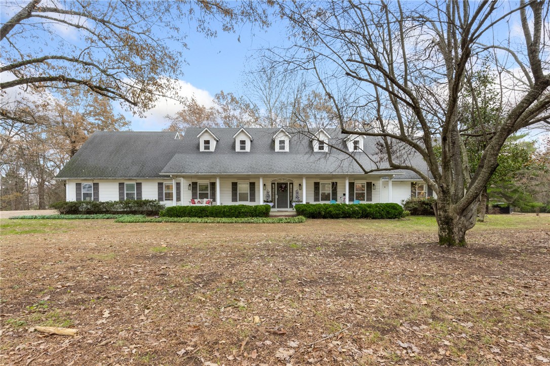 Like straight out of a Hallmark movie, this traditional 5 bedroom, 3.5 bath over 3500 square foot iconic property has it all. It features primary suites on both floors, a home office, a very spacious living room with a remote control gas fireplace, an eat-in kitchen with stainless appliances, a large pantry, a great center island for entertaining, a 25 ft x 24 ft insulated shop building, and the coolest part, all of this is on almost 3 acres in a very desirable neighborhood in town. Close to schools and a short drive to groceries. This property has never been offered on the public market, don't let this once in a lifetime property pass you by!!