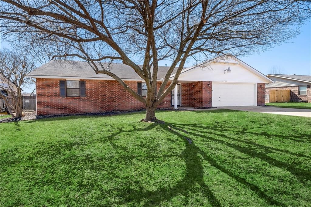 Well-maintained 3BR/2BA home in the heart of Springdale. This property features updated flooring, and a spacious living area. The kitchen includes stainless steel appliances, pantry, and breakfast bar. Primary suite offers a walk-in closet and private bath. Two additional bedrooms provide flexibility for guests, family, or a home office. Bonus room/sunroom provides ample spacing for entertaining. Fully fenced backyard with patio, perfect for outdoor entertaining. Two-car garage, central HVAC, and washer/dryer hookups. Located close to schools, shopping, dining, and quick access to I-49. Pets ok. Available for immediate occupancy.