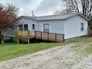 Why pay rent when you can own your own home? One level acre at end of road in quiet neighborhood. Relax outside on your deck with your feet soaking in your pool. Fenced in back yard ready for your dog. Even a shed to store your lawn supplies.