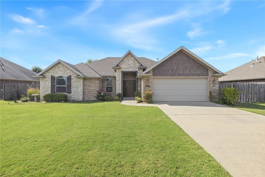 Well-maintained, West Fayetteville home! Featuring all brick/natural stone exterior. Conveniently located near I-49 and the University of Arkansas, and just around the corner from Holcomb Elementary. Split floor plan! Fun fact about this home is that it was the model home for the neighborhood when it was originally built! New HVAC in 2024.This home has lots of pros, come and check it out!
