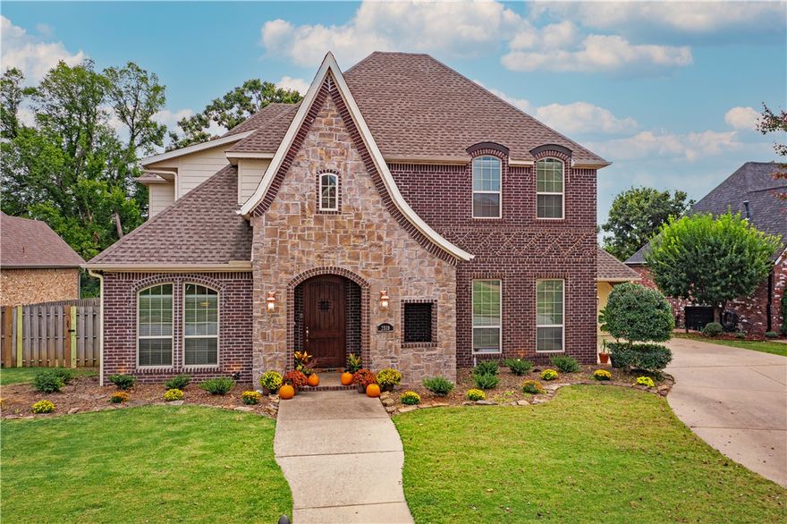 This listing checks the boxes for your next dream home: Walking distance to the largest shopping area in NWA, a prestigious high end neighborhood, unique character and style, an amazing entertaining space! Despite the central location, the property also has wooded privacy in back! Like many homes in Turnberry at the Peaks, this one boasts a classy and elegant European style. Inside, the kitchen is open to the living room, and there are many large spaces that create opportunities throughout. There is plenty of extra space upstairs including 2 bonus rooms, a 2nd office, or hobby room. The entertainment area in the back is hard to beat, it features a huge covered back deck with a kitchenette, a roll down projector screen, and ceiling mounted patio heaters! The view from there overlooks a serene wooded privacy featuring a clear view of a pond with a water fountain. This home also comes with a 1 year home warranty, and the subdivision has a community pool. Don’t let this opportunity go!