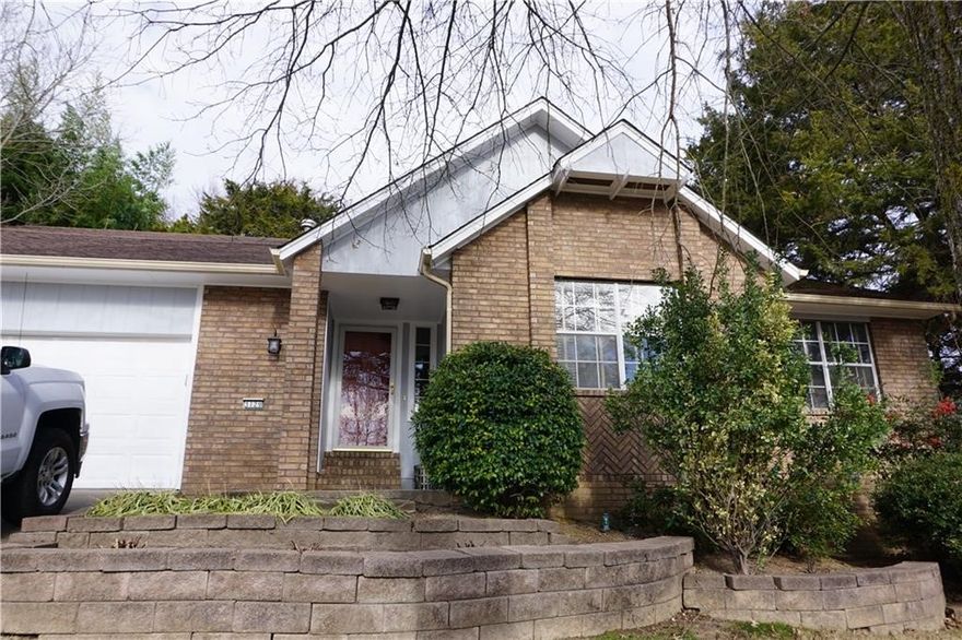 Absolute adorable home that has numerous updates and is move -in ready! Updated kitchen with custom cabinets, granite counter tops & nice appliances. Living room is huge with wood burning fireplace. Master bath has Whirlpool tub/ shower and granite counter tops. New granite to be installed in guest bath. Formal dining room has wood accent ceiling. Eat-in kitchen has breakfast area with built-in seating. All bedrooms have walk-in closets! Updated light fixtures 2" blinds throughout. Nice deck. Great neighborhood. Close to everything!