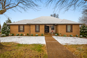 Beautiful 4 bedroom, 4 bath custom built brick home on 3 lots in Harrison, Arkansas. Gorgeous view of the Ozark Mountains from the large partially covered deck! Vaulted ceilings and fireplace in living room, nice fully equipped kitchen with pantry cabinet and pull out shelves. Spacious formal dining room, big utility room with folding table, desk, cabinets and large closet. Roomy master bedroom with multiple closets. Den in basement with fireplace. Huge drive -in storage room in basement. Includes a new asphalt architectural shingled roof to be paid for by seller.