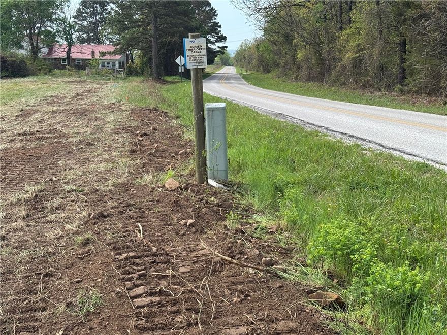 Beautiful views on blacktop road 15 minutes to Farmington & 15 minutes to Lincoln or Prairie Grove. Large, beautiful tracts with awesome views. Soil test has been done. Splits are in process. No mobiles or chicken houses. Rural water is available from Lincoln. More acreage available. Agent owned. Acreage is subject to change. See ML# 1342729, 1342731-1342736