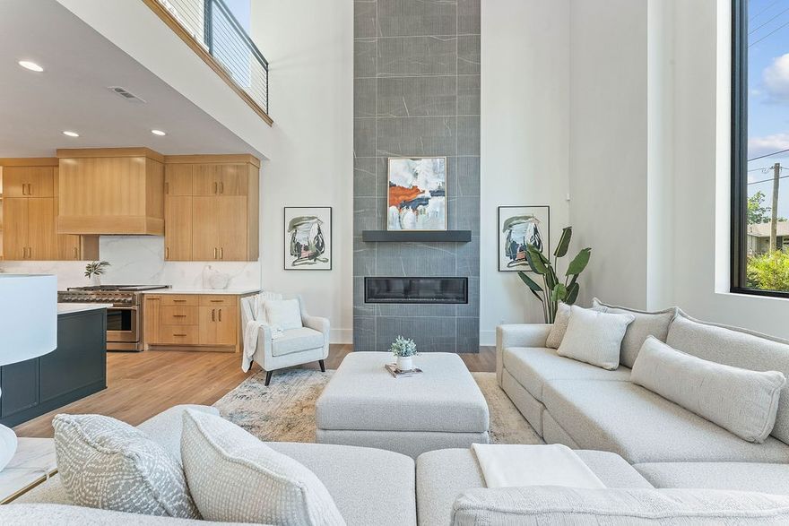 FREE pool with purchase of home! Experience modern luxury living in the heart of downtown Bentonville with this stunning new construction home, designed for comfort and entertainment with seamless indoor/outdoor flow. Boasting 20-foot ceilings, open living spaces filled with natural light, and luxury finishes throughout, this home features a gourmet kitchen with custom rift-sawn oak cabinetry, high-end appliances, a wine and beverage fridge, ice maker, and walk-in pantry. Enjoy the flexibility of an executive office, bonus entertaining room or bar, spacious bedrooms with walk-in closets, and a garage apartment with a separate entry, perfect for a short-term rental or next-gen living. Located steps from the new Walmart Home Office, AWSOM Medical School, Crystal Bridges, and a vibrant community filled with restaurants, shopping, and entertainment, this is your chance to live the downtown lifestyle. Schedule your tour today! Lots behind home for sale with another 0.69 acres.