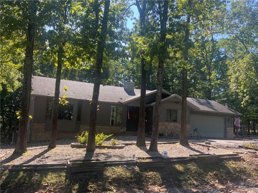 Experience the best of both worlds with this 3 bedroom, 2 bath home.  Its close proximity to Bella Vista’s amenities is a notable benefit.  Outdoor enthusiasts will appreciate the nearby bike trails, golf courses, fishing spots, and more.  The residence provides a tranquil setting while remaining conveniently close to town.