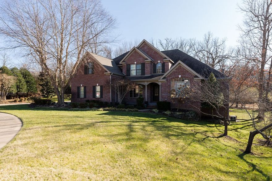 Beautifully maintained 5 Bedroom 4.5 Bath home in the gated community of Clear Creek! This remodeled beauty features an open floor plan, new hardwood floors downstairs & in the Master Bedroom, finished basement, hearth room with gas log fireplace, & formal dining room. Cook in style in the gourmet kitchen that includes granite countertops, stainless steel kitchen appliances, Dacor gas cooktop, double convection and thermal ovens, a Kitchen Aid built in refrigerator & Eat-In Kitchen. Relax by the gas log fireplace in the Hearth Room that is accessible to the STUNNING new Wet Bar or step out onto the deck & enjoy the view from the stone patio sitting area. Head upstairs where you will find a Bonus/Media Room & 3 large bedrooms with 2 Jack & Jill baths. Finished heated & cooled basement includes 5th bedroom, full bath, and additional living area. Also includes a partial home back-up generator and Central Vac system. Manicured professional landscaping creates charming curb appeal for a home you just don’t want to miss!