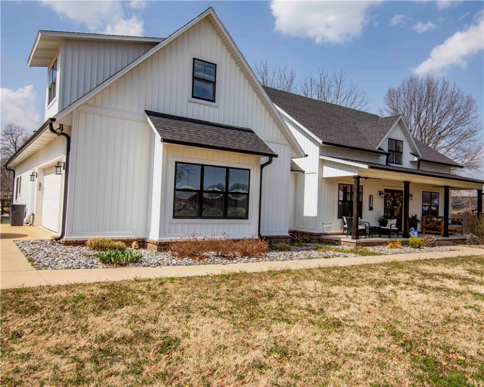 Discover the perfect blend of space and comfort with this stunning 2,611 sq. ft. home, nestled on a beautiful one-acre lot close to schools and activities. From the moment you arrive, you'll be greeted by a welcoming covered front porch, perfect for enjoying peaceful mornings. Thoughtfully designed for functionality and flow, this home boasts a perfect floor plan for entertaining and comfortable family living. A split floor plan gives you ultimate comfort and privacy. The spacious kitchen includes premium appliances, sleek countertops, and ample cabinetry with a wonderful pantry. Step out back to a covered porch, designed for relaxation and entertaining while overlooking your large back yard with fire pit and gathering area. Nestled in a desirable neighborhood, this home is within walking distance of schools, and park area. Whether you're looking for a peaceful retreat or the perfect space to entertain, this property checks all the boxes. Don't miss this incredible opportunity.