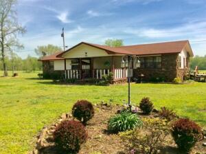 Room to grow in this almost 2000sqft home on 5 aces boarding County Road 4400. Huge living room that has beautiful cedar walls. Large Kitchen with all appliances, new heat and air unit as well as new roof! New 2 car carport for parking and a small work shop on the property. Home has spacious rooms, also a 4th room perfect for office space or craft room. 5 acres of pasture, level and cleared