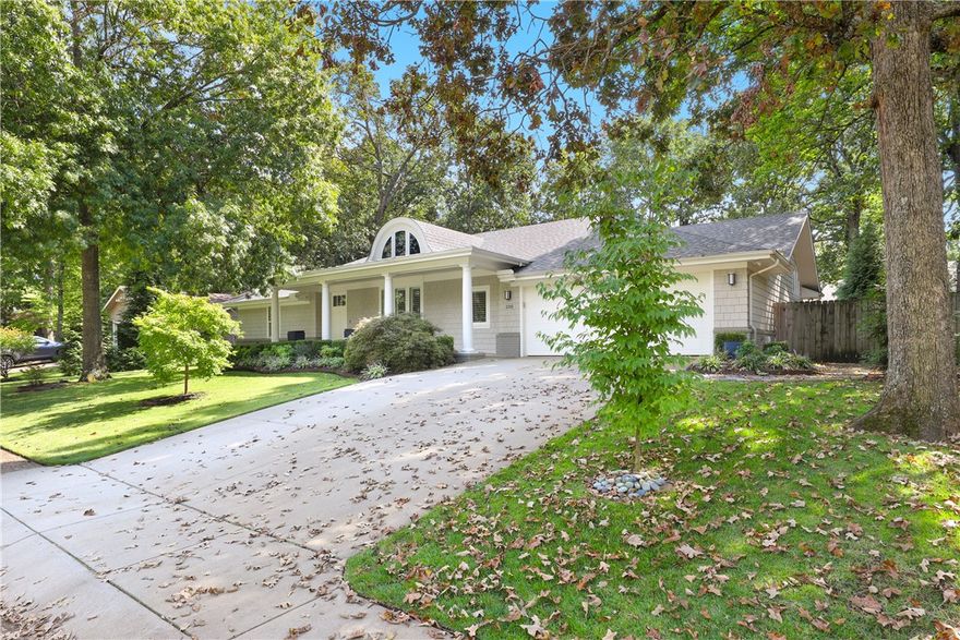 Welcome home! Beautiful 3 bed, 2.5 bath, 2,866 sqft home in the East Oaks S/D. Located in the heart of Fayetteville, just a lovely short walk from Gulley Park. Upon entering you will appreciate the beautiful wood floors, vaulted ceilings, and accent lighting. The gorgeous, light wood beams crossing the ceilings complement the home perfectly. The spacious kitchen is a dream, with all wolf appliances, beautiful granite counters, a double oven, a gas range with a kettle facet, and a Panel-Ready Refrigerator. The formal dining room boasts stained glass windows and chandler to match. In the Family Room or second living room, the gas-burning fireplace makes for a cozy atmosphere. The bedrooms are spacious and carpeted for comfort. The primary suite is a true retreat with built-in bookshelves, a luxurious private full bath with dual vanity, a soaking tub, and a large walk-in closet. This home also features a sun room with a great view of the large, landscaped backyard.