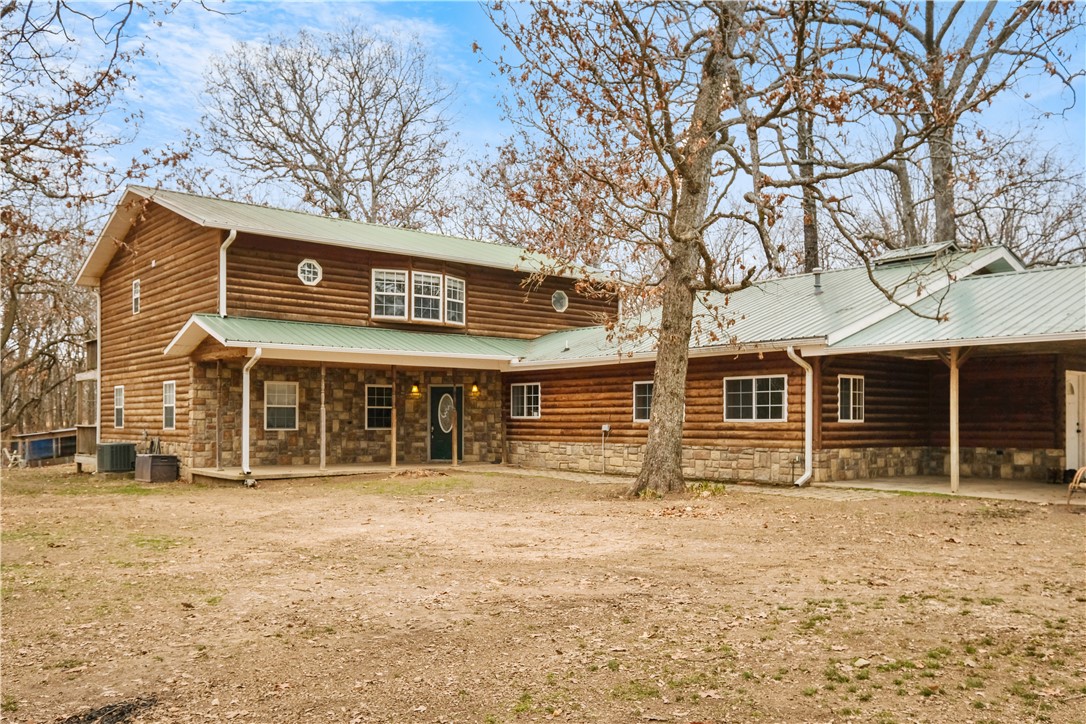 Country charm just outside of town, this beautiful home has so much to offer! With over 24 acres, 6 bedrooms, and 3 bathrooms this home has enormous potential. It includes an oversized primary suite, large bonus rooms, additional living areas, an upper and lower walkout deck, a secondary home, detached garage/shop, a shed, an outdoor sitting area, and much, much more! Come check out your new home today!