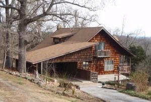 Fantastic private setting on 2.5 acres only a few miles from town. It has 3 levels to enjoy including finished walk-out basement with second kitchen. all overlooking usable property for relaxing or gardening.