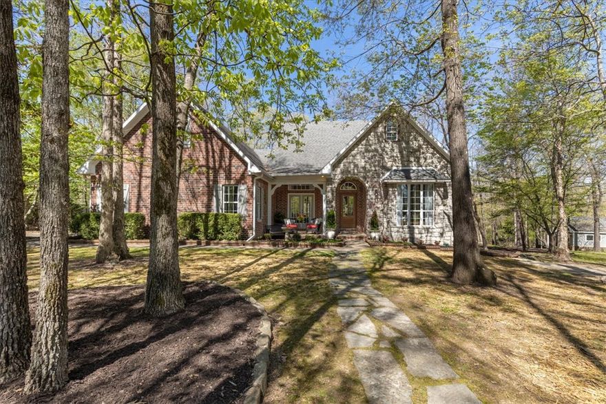 Set on over 4 picturesque acres in Double Tree Estates, this beautiful estate offers a rare blend of privacy, space, and resort-style living. Surrounded by a serene, park-like setting with mature trees and manicured grounds, the main home features 4 bedrooms and 4 bathrooms with an open floor plan featuring beautiful wood floors, Quartz counters and Plantation Shutters. Also on the property, a charming 1 bedroom/1 bathroom guest house offers flexibility for visitors or extended family and also can be used as a short-term rental. Across the main lawn, a well-equipped workshop provides ample space for weekend projects or simply some extra storage. On the other side of the property, enjoy a full-size private Tennis court perfect for inviting friends over for a weekend game of Tennis or even Pickleball. Then enjoy the built-in grill area with an outdoor fireplace and dining area with gazebo. All of this set in a wooded peaceful oasis and yet still close to everything Fayetteville has to offer. Schedule a showing soon!