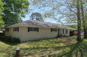 Great Buy!Live out the dream of home ownership in this 2,239-SF brick home in Yell County. Just across the street from the hospital and within walking distance to schools and shopping. Just needs a little TLC and your creative mind to fix it up.