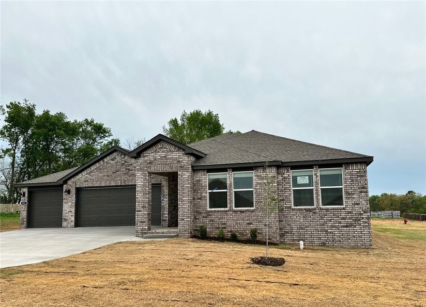 Sold before print! Delightful Dean plan (With a 3-car garage!!) Find your new home in Northwest Arkansas in Hudson Heights in Prairie Grove. These homes have fabulous features for comfortable, modern living. Each home features LVP flooring throughout! The living room features a beautiful electric fireplace with a poplar mantle! Kitchens have Quartz countertops, stainless steel appliances, and a stainless steel undermount kitchen sink with a pull-out faucet! Bedroom one with en-suite will feature a ceiling fan, quartz counters with dual sinks, oversized Walk in Shower and a walk-in closet. Home will be 4-sided brick, covered patio (per plan) Taxes and Parcel TBD. Have your agent take you to our model at 1002 Vista!