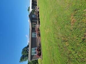 *Entered into MLS for comp purposes*Beautiful property sitting just outside Altus city limits. Top of the line double wide on permanent foundation and city sewer with 4 bedrooms and 2 full bathrooms. 30x60 shop with 4-stall RV sized carport. 6.17 acres with a pond and a concrete outbuilding for storage