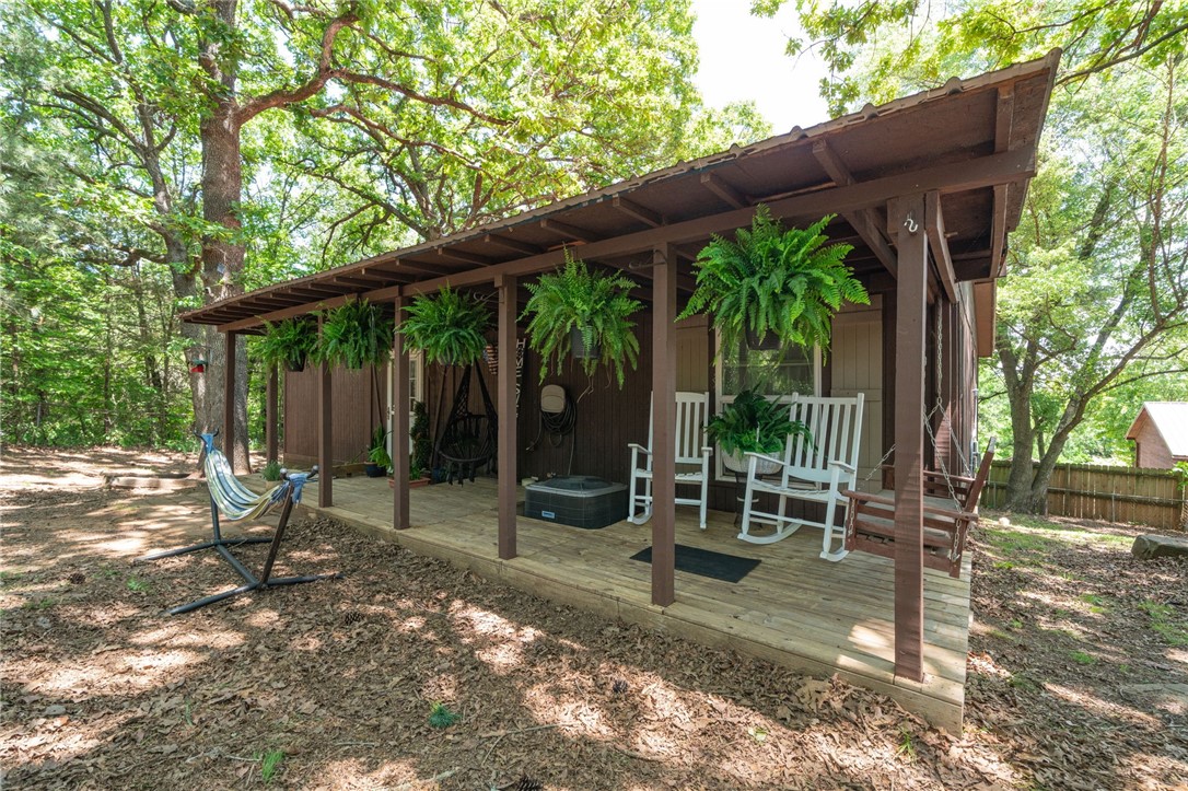 Tucked away in the trees on a spacious lot just outside of Elkins, this unique home offers a perfect blend of comfort, functionality, and natural beauty. With a cozy living space, a den, large bedrooms, and a huge walk-in primary closet, this home is ideal for those who value peace and privacy.
Enjoy the outdoors from the large back deck with scenic views or unwind on the charming covered front porch. The newer metal roof and recent updates include fresh paint, newer flooring, and modern stainless steel appliances with a gas range.
Two versatile outbuildings with electricity provide excellent space for a workshop, home office, or creative studio. Inside, youāll find thoughtful touches like barn doors, a cozy living area, and an open kitchen that comes complete with a refrigerator, barstools, and even a washer and dryer.
Located in the Elkins School District, this peaceful property offers a secluded feel without sacrificing convenience. HVAC and water heater are only 3 years old for added peace of mind.